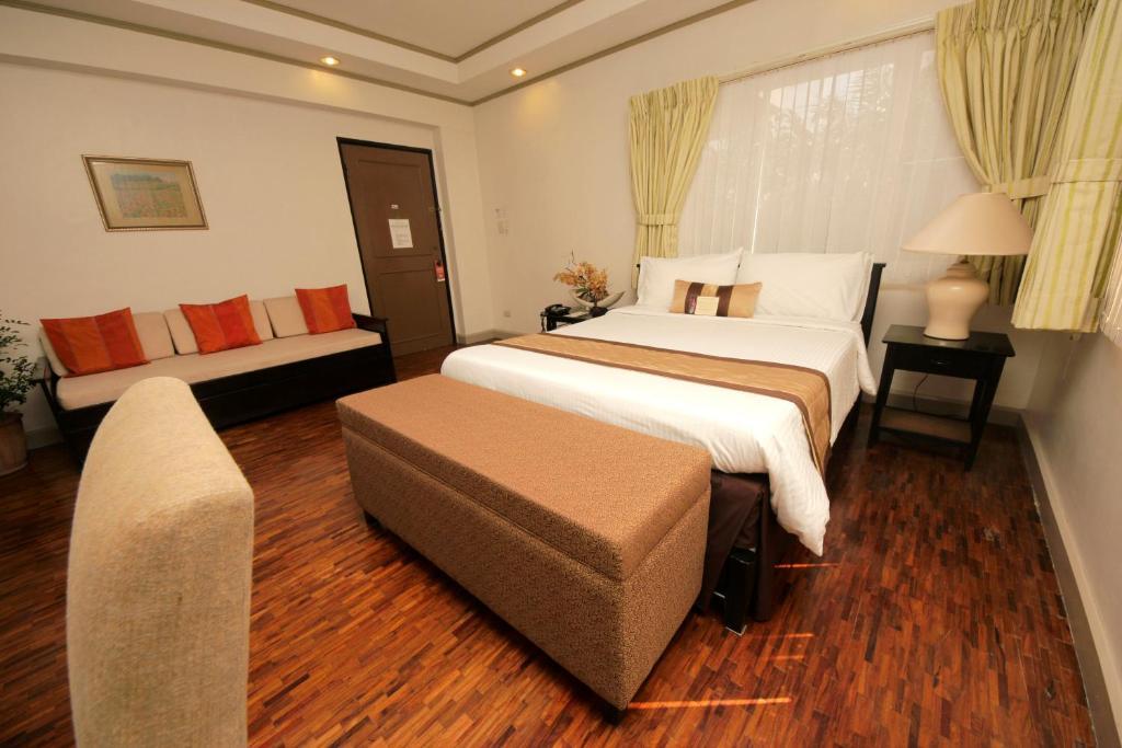 Casa Pura Inn And Suites Quezon City Rum bild
