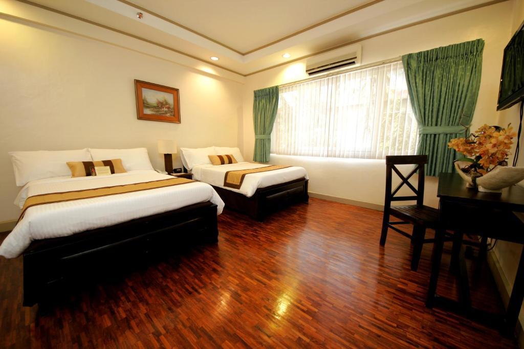 Casa Pura Inn And Suites Quezon City Rum bild