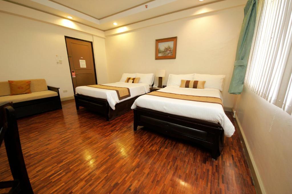 Casa Pura Inn And Suites Quezon City Rum bild